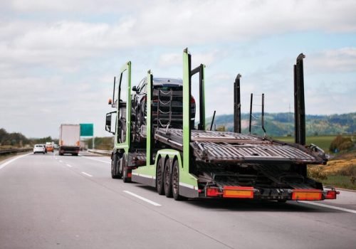 car-vehicle-hauling-dealer-carrier-truck-trailer-worldwide-transporter_909686-809