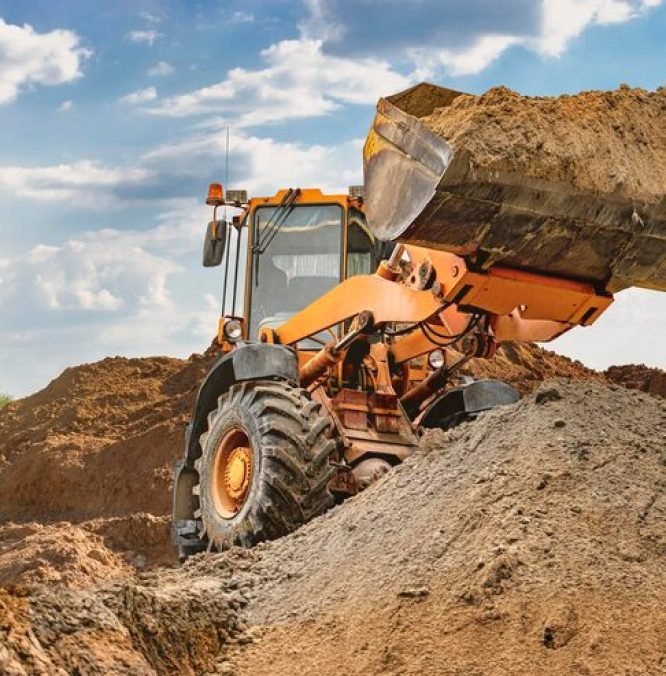 wheel-front-loader-bulldozer-pours-sand-distributes-sand-road-construction-powerful-earthmoving-equipment-construction-site-rental-construction-equipment_331695-8940